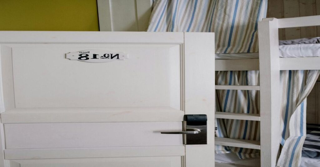 modern clean boutique hostel dorm room bunk beds lockers