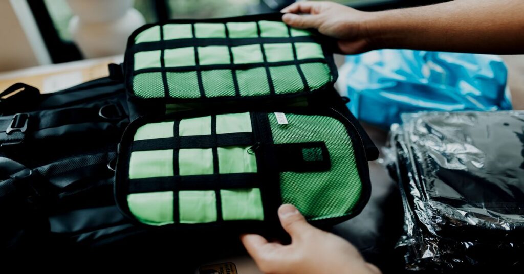 15 Smart Solo Travel Budget Tips to Save Money & Pack Light 3 packing cubes open backpack organized travel gear