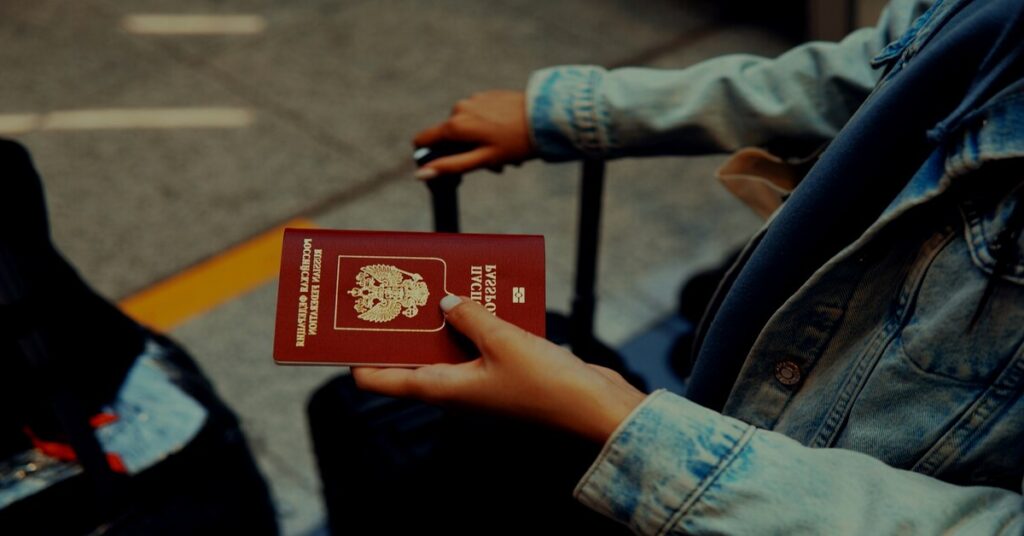 Solo Travel Tips for Seniors: A organized passport, map, and leather luggage ready for a safe journey