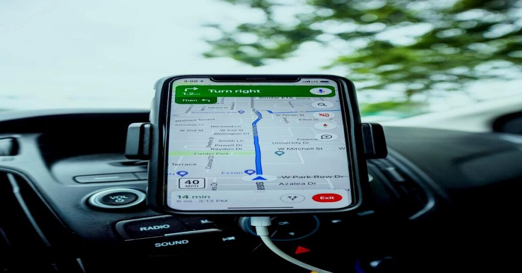 15 Smart Solo Travel Budget Tips to Save Money & Pack Light 1 smartphone navigation map cafe travel app