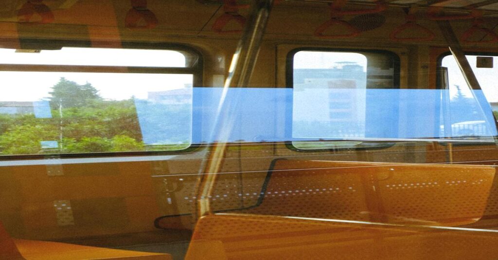 train window view scenic landscape empty transit seat train