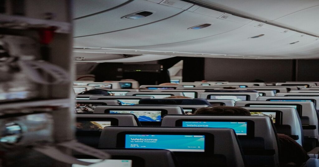 Split Isolation Deals: Unlock Secret Solo Flight Savings 8 Split Isolation Deals: Unlock Secret Solo Flight Savings showing solo traveler analyzing flight prices on laptop