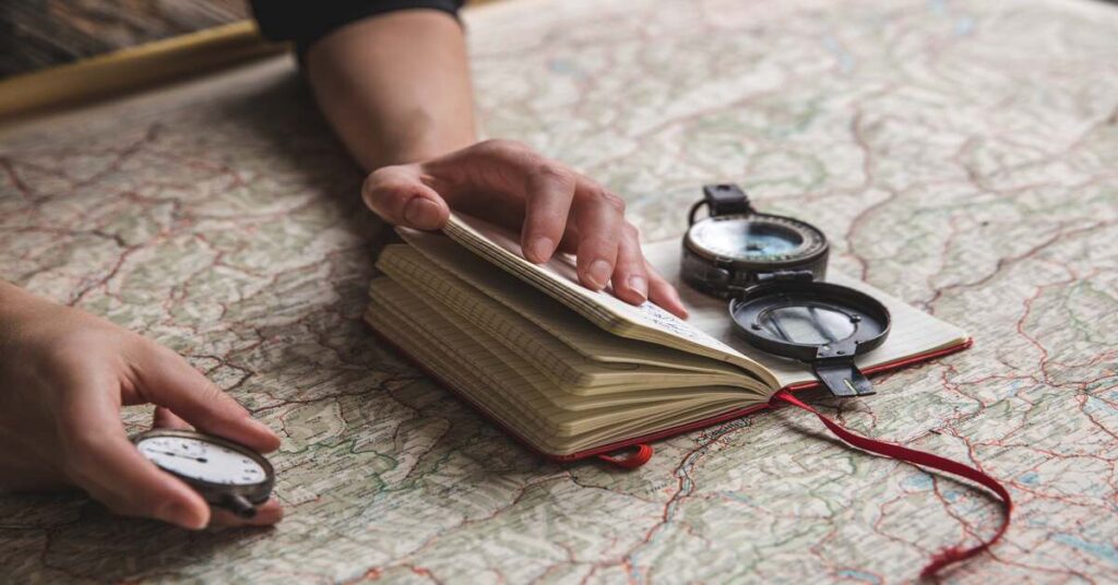Solo Travel Navigation Tips for Beginners: Travel Confidently 1 Solo Travel Navigation Tips for Beginners: Travel Confidently studying city map outdoors