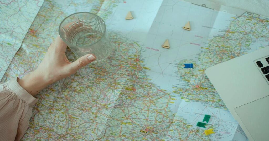 confused traveler planning map laptop budget travel