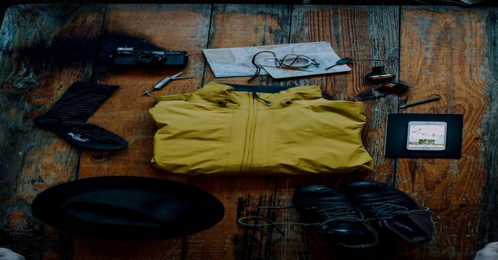 Minimalist adventure gear close up travel tools packing items no people