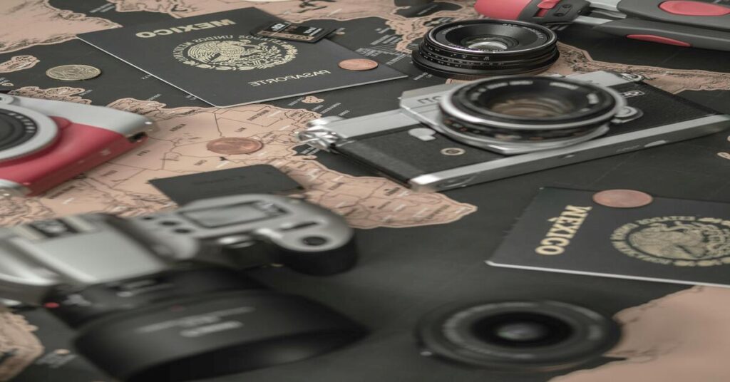 travel items flat lay camera passport map
