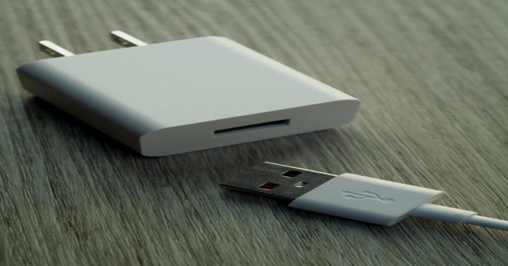 white travel adapter tech close up