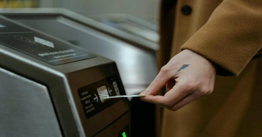 Person scanning boarding pass phone airplane ticket airport gate