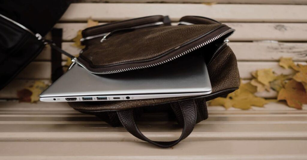 backpack compartments laptop section close up travel bag interior