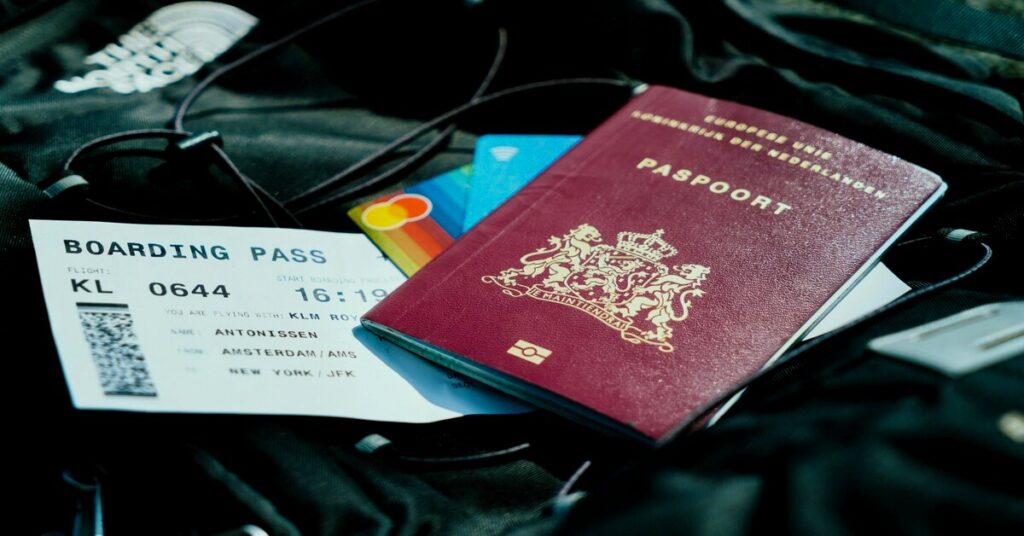 Best Noise-Canceling Headphones for Travel (2026 Flight Guide) 1 headphones for travel folded next to a passport