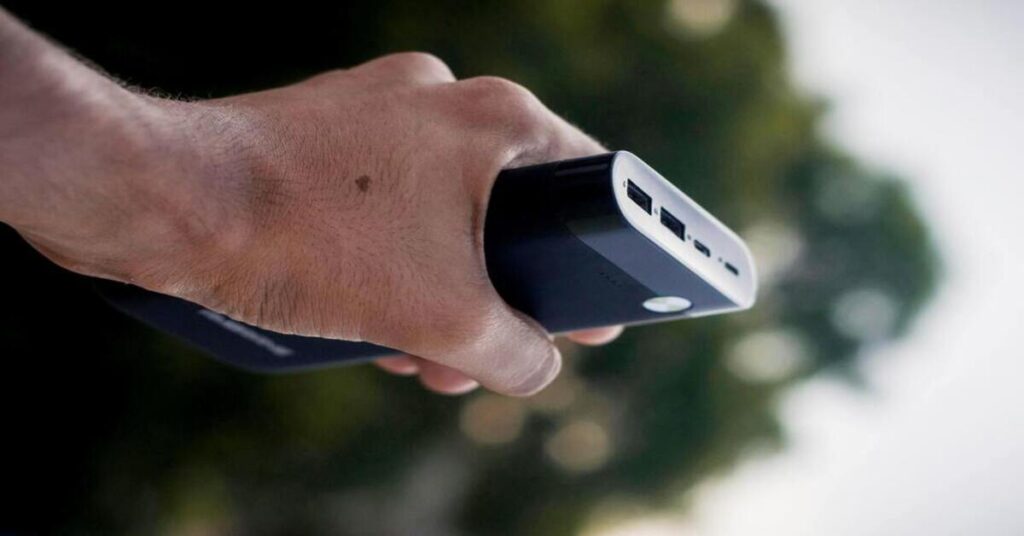 Best Power Bank for Travel in airplane showing phone charging during long international flight