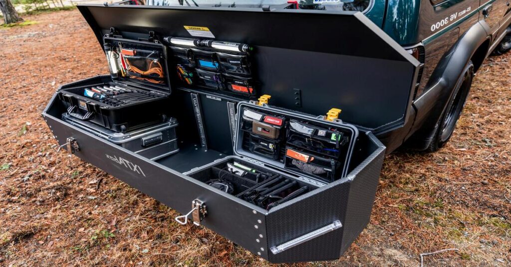 packed luggage trunk car camping travel gear storage organizer