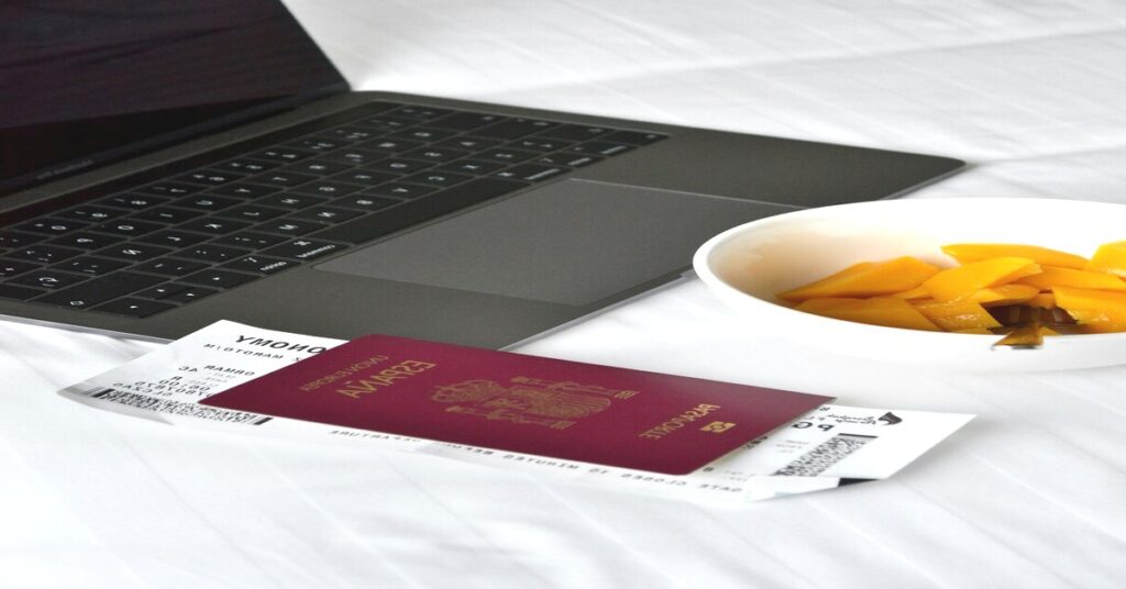 Best power bank for travel essentials packed next to a smartphone and laptop ready for an international flight