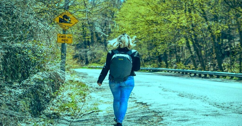 Solo travel safety tips for first-time travelers in urban city with secure backpack