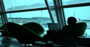 🌍 SOLO TRAVEL GUIDE 1 Hidden Solo Travel Deals That Save You More Money while booking flights at airport window