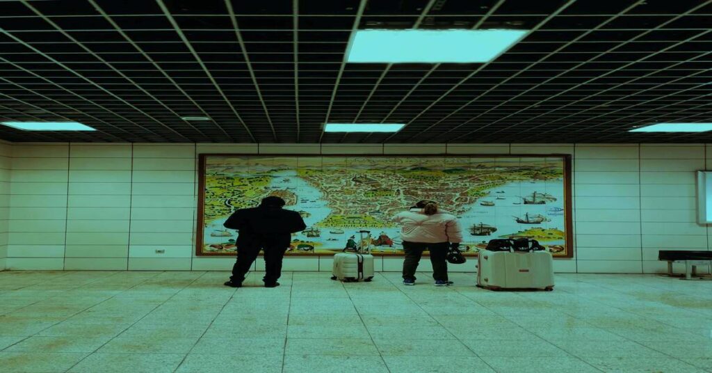 Solo Travel Safety Tips for First-Time Travelers 1 solo traveler planning map luggage