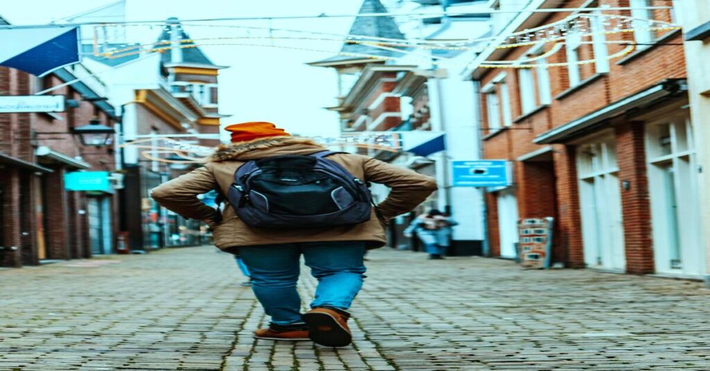 11 Best US Solo Travel Destinations lifestyle solo traveler walking American street enjoying freedom and confidence