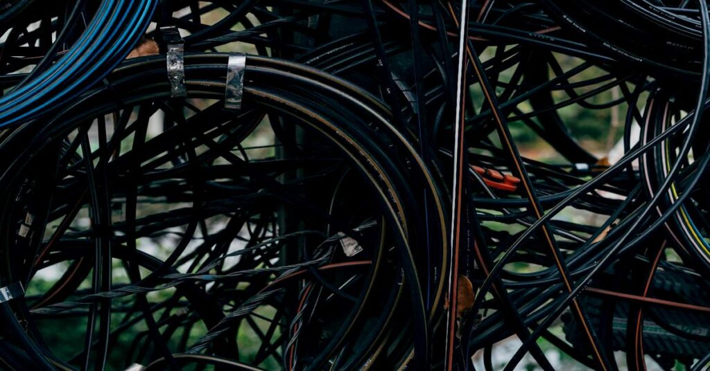 tangled messy cables wires luggage travel frustration