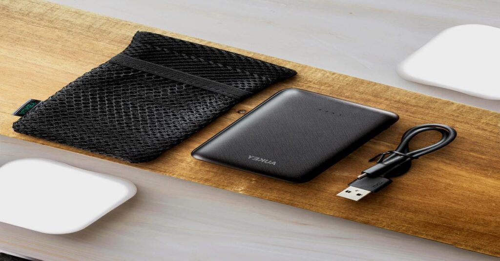 Travel charging setup that never fails featured as a clean flat-lay layout of minimalist electronic packing essentials