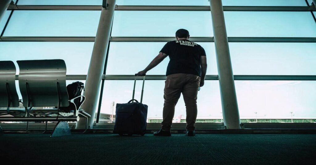 traveler packing backpack airport travel lifestyle