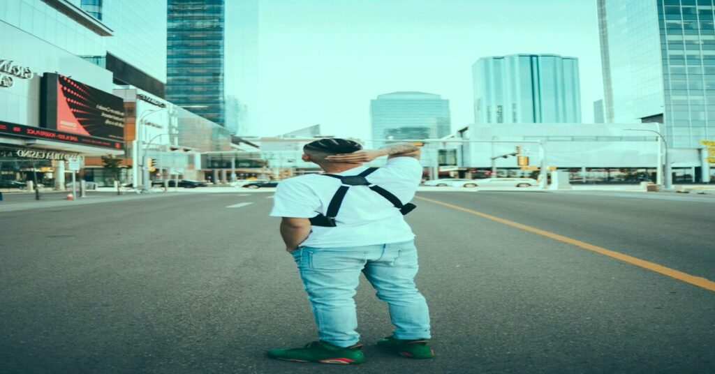 confident solo traveler walking city street alert posture travel safety