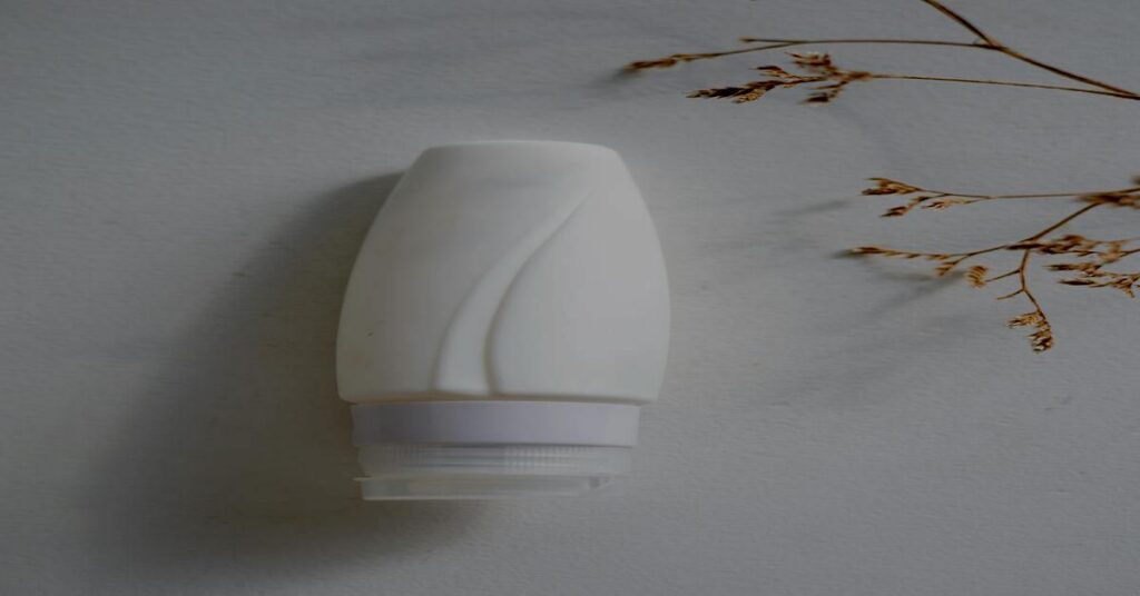 foldable silicone bottle product flat lay travel gear